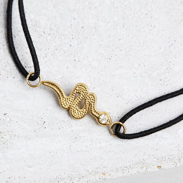 Bracelet cordon avec serpent acier doré